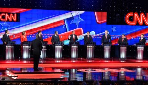 Republican presidential candidate businessman Donald Trump, center, speaks during the Republican Presidential Debate, hosted by CNN, at The Venetian hotel-casino on Dec. 15, 2015 in Las Vegas, Nevada. (Credit: Robyn Beck/AFP/Getty Images)