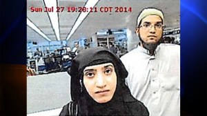 Tashfeen Malik and Syed Rizwan Farook were photographed at O'Hare Airport in July 2014. (Credit: Chicago O'Hare Airport via CNN Wire)