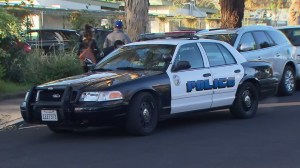 A police vehicle was parked outside Colfax Elementary School in Valley Village on Dec. 16, 2015. (Credit: KTLA)