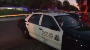 Police responded after a body was found inside a refrigerator in a garage at a Santa Ana home on Dec. 17, 2015. (Credit: KTLA)