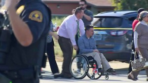 People are seen near the Inland Regional Center after a mass shooting on Dec. 2, 2015. (Credit: KTLA)
