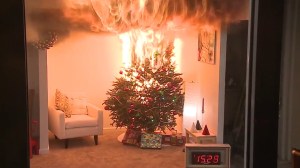 A Christmas tree engulfed in flames is seen in a U.S. Consumer Product Safety Commission video posted on YouTube on Dec. 8, 2015.