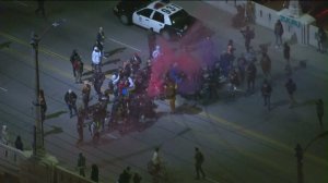 Police were called in when hundreds of people and cars began to gather on the iconic Sixth Street Bridge on Jan, 26, 2016. (Credit: KTLA)