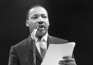 The US clergyman and civil rights leader Martin Luther King addresses, 29 March 1966 in Paris' Sport Palace the militants of the 'Movement for the Peace'. (Credit: /AFP/Getty Images)