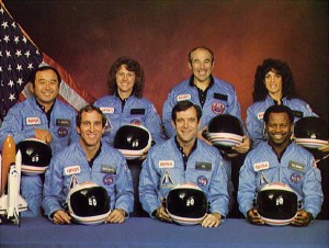 Space Shuttle Challenger crew members gather for an official portrait November 11, 1985 in an unspecified location. (Back, L-R) Mission Specialist Ellison S. Onizuka, Teacher-in-Space participant Sharon Christa McAuliffe, Payload Specialist Greg Jarvis and mission specialist Judy Resnick. (Front, L-R) Pilot Mike Smith, commander Dick Scobee and mission specialist Ron McNair. (Photo by NASA/Getty Images)