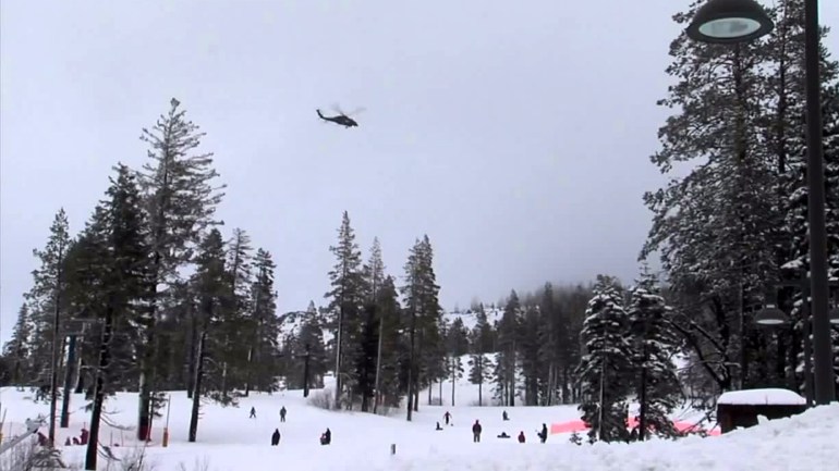 A helicopter searches for Carson May at Sugar Bowl Resort on Jan. 18, 2016. (Credit: KTXL)