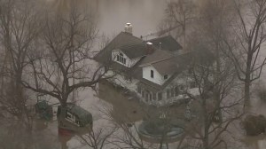 A home in New Athens, Illinois, is surrounded by flood waters on Thursday, Dec. 31, 2015. (Credit: KMOV)