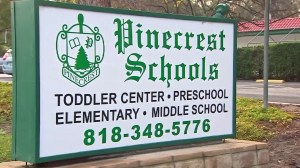 A sign in front of the Pinecrest school in Woodland Hills is seen on Jan 19, 2016. (Credit: KTLA)