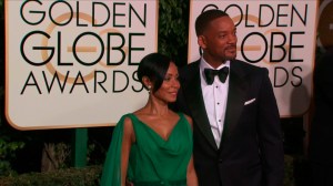 Will Smith and Jada Pinkett Smith on the red carpet before the 73rd Golden Globe awards in Los Angeles, January 10, 2016. (Credit: Pool)