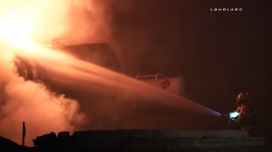 Firefighters battled 30 foot flames after a tar-filled tanker caught fire in Ontario on Feb. 23, 2016. (Credit: Loudlabs)