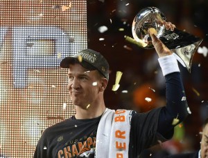 Peyton Manning of the Denver Broncos celebrates with the Vince Lombardi Trophy after Super Bowl 50 at Levi's Stadium in Santa Clara on Feb. 7, 2016. The Broncos beat the Carolina Panthers 24-10. (Credit: TIMOTHY A. CLARY/AFP/Getty Images)