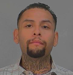 The Santa Ana Police Department provided this booking photo of Carlos Michael Rodriguez on Feb. 18, 2016.
