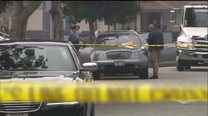 A mother and son were fatally wounded in a drive-by shooting in the 19500 block of South Tillman Avenue in Carson on Feb. 27, 2016. (Credit: KTLA)