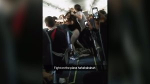 Cellphone video shows a group of women fighting aboard a Spirit Airlines flight. (Credit: Magu Pitt via Instagram)