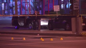 An investigation was underway into a car-to-car shooting in Gardena that left one dead and two others injured on March 20, 2016. (Credit: KTLA) 
