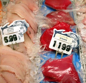 DES PLAINES, IL - DECEMBER 12: Fresh tuna steaks are displayed at a seafood counter in a grocery store December 12, 2003 in Des Plaines, Illinois. The Food and Drug Administration's Food Advisory Committee plans to caution pregnant women, nursing mothers, women who may become pregnant, and young children to limit their intake of tuna, such as fresh tuna steaks because of their higher levels of mercury. (Photo by Tim Boyle/Getty Images)