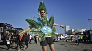 Scott Dunlap comes in costume to the 420 Games, held for the first time at the Santa Monica Pier. The fun run started half an hour late. (Credit: Irfan Khan/Los Angeles Times)
