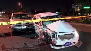 A wrong-way driver who was suspected of DUI crashed into six vehicles, including one with an Uber sticker, in Huntington Beach on March 17, 2016. (Credit: KTLA)