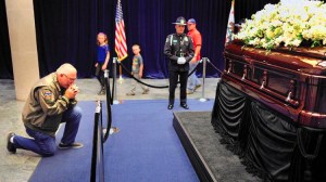 Steven Leslie prays in front of the casket of former First Lady Nancy Reagan at the Reagan Presidential Library in Simi Valley on Wednesday. (Credit: Wally Skalij/Los Angeles Times)