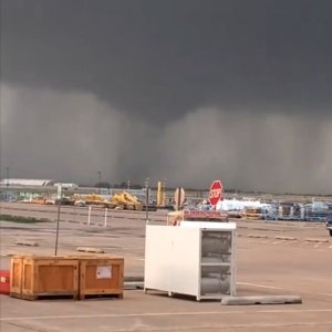 Marc Anthony Bartlett took this near Tulsa International Airport showing a tornado forming in the distance. (Credit: Marc Anthony Bartlett/Instagram)