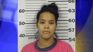 A booking photo shows Ashley Lewis. 