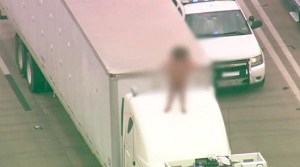 A naked woman was seen dancing on top of a big rig in Houston on March 7, 2016. (Credit: KPRC via CNN)