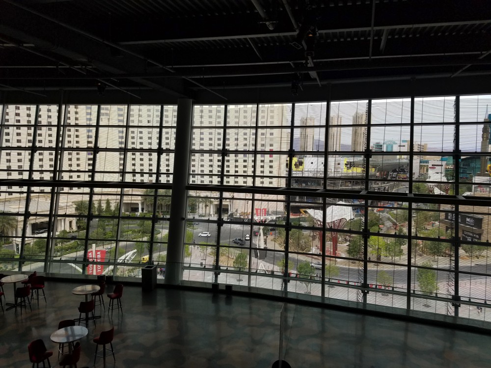 View from inside T-Mobile Arena looking through mesh video screen.