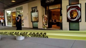 Police tape is seen outside a Ben Bridge store at the Santa Monica Place shopping mall on April 24, 2016. (Credit: KTLA)