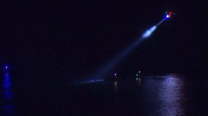 Coast Guard personnel searched for a missing boater off Rancho Palos Verdes on April 8, 2016. (Credit: KTLA)