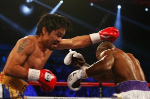 Manny Pacquiao goes on the attack against Timothy Bradley during their WBO welterweight title bout at the MGM Grand. (Photo by Christian Petersen/Getty Images)