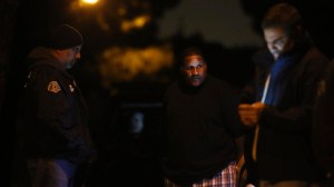 LAPD Swat officers and DEA agents served a warrant on suspected skid row drug kingpin Derrick Turner in Cerritos early Wednesday morning as part of a massive drug sweep. (Credit: Barbara Davidson/Los Angeles Times)