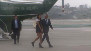 President Obama and daughter Malia share a laugh as they walk across the tarmac at LAX on April 8, 2016. (Credit: pool)