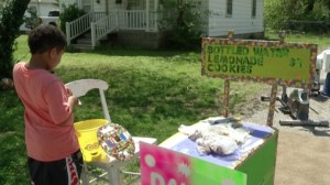 Nine-year-old Tristan is seen near his lemonade stand in Springfield, Missouri. (Credit: KYTV)