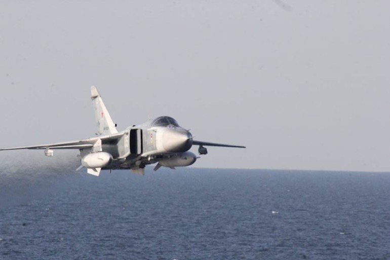 160412-N-ZZ999-005 A Russian Sukhoi Su-24 attack aircraft makes a very low-altitude pass by USS Donald Cook April 12, 2016, in this photo released by the U.S. Navy.