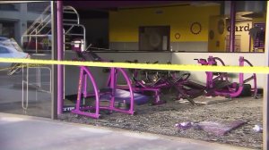 The car came through a glass wall at the front of the building and didn't stop until it hit the back of the gym, the Torrance Police Department stated on April 27, 2016. (Credit: KTLA)