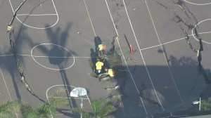 Repairs were underway after the ground partially collapsed at Linda Esperanza Marquez High School on April 12, 2015. (Credit: KTLA) 