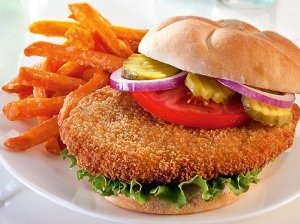 The chicken -- in boxes of whole-grain breaded nuggets, patties (pictured), breakfast patties, tenderloins and popcorn-style varieties -- may be contaminated with "extraneous materials," the U.S. Department of Agriculture said. (Credit: Pilgrim's Pride)