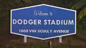 A sign at Dodger Stadium shows the location as 1000 Vin Scully Avenue on April 11, 2016. (Credit: KTLA) 