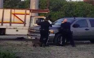 Police apparently fired on a man who had been armed with a chainsaw at an industrial property in Torrance on April 12, 2016. (Credit: Dino Mendoza)