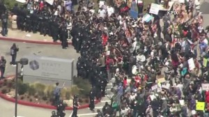 Protesters tried to get into the Hyatt Hotel in Burlingame, where Donald Trump was slated to speak on April 29, 2016. (Credit: KPIX) 
