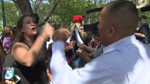 Pro and anti-Trump forces face off at a rally in Anaheim on April 26, 2016. (Credit: KTLA)