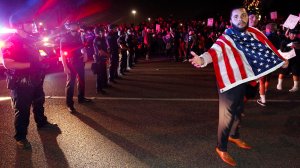 Protesters were in the streets of Costa Mesa during a Donald Trump rally on April 28, 2016. (Credit: Barbara Davidson/ os Angeles Times)