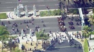 Officers move toward straggling protesters following a Donald Trump rally in Anaheim on May 25, 2016. (Credit: KTLA)