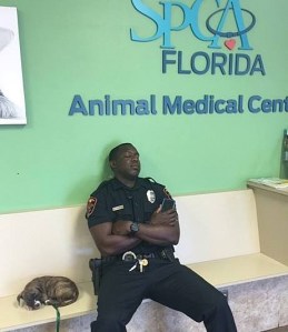 Officer Kareem Garibaldi and "Hope" are seen in a photo posted to the City of Lakeland, Florida's Facebook page. 