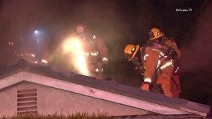 A man's body was found inside a burning home in Fullerton on May 6, 2016. (Credit: OnScene.TV)