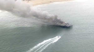 Fire boats respond to a fire on the Seal Beach Pier on May 20, 2016. (Credit: KTLA)