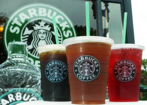 Starbucks' new iced coffee and tea beverages are displayed during a promotion July 2, 2003 outside a Starbucks coffee shop at Dupont Circle in Washington, DC. (Credit: Alex Wong/Getty Images)