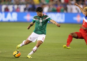 Alan Pulido of Mexico handles the ball during the International Friendly against USA at University of Phoenix Stadium on April 2, 2014, in Glendale, Arizona. (Credit: Christian Petersen/Getty Images)