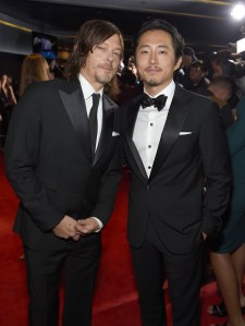 Norman Reedus, l, and Steven Yeun, r, attend AMC's 'The Walking Dead' Season 6 Fan Premiere Event 2015 at Madison Square Garden on October 9, 2015 in New York City. (Credit: Jamie McCarthy/Getty Imagesfor AMC)