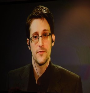 Edward Snowden speaks during a live video feed at Politicon in Los Angeles on October 10, 2015. (Credit: Frederick M. Brown/Getty Images)